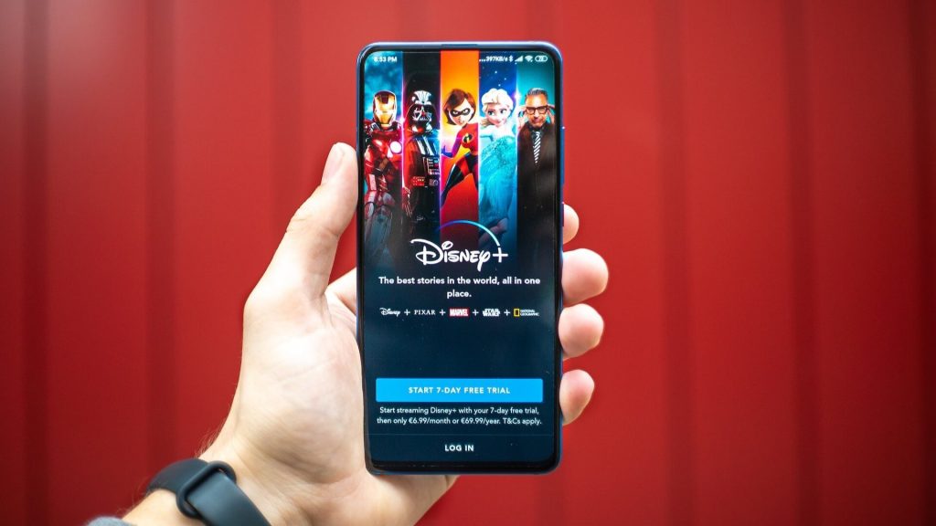 Phone with the Disney+ app open.